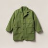 Birch Chore Coat in Moss — boxy button-front chore coat with two patch pockets on a light grey backdrop