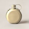 Cedar Canteen in Sand — round flat-sided canteen with a screw cap and a carry strap on a light grey backdrop