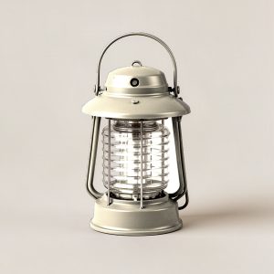 Cedar Lantern in Cream — camp lantern with a domed top, carry handle and ribbed diffuser on a light grey backdrop