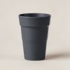 Cedar Pint Cup in Charcoal — stackable pint cup with a flared rim on a light grey backdrop