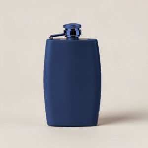 Cedar Trail Flask in Navy — slim hip flask with a hinged screw cap on a light grey backdrop