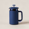 Cedar Travel Press in Navy — travel coffee press mug with a plunger lid and a handle on a light grey backdrop
