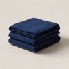 Cedar Wool Blanket in Navy — thick woven wool blanket with stitched edges, folded on a light grey backdrop
