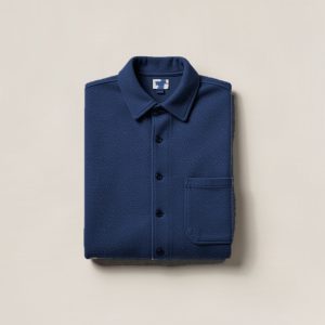 Driftwood Flannel Shirt in Navy — button-up flannel shirt, folded on a light grey backdrop