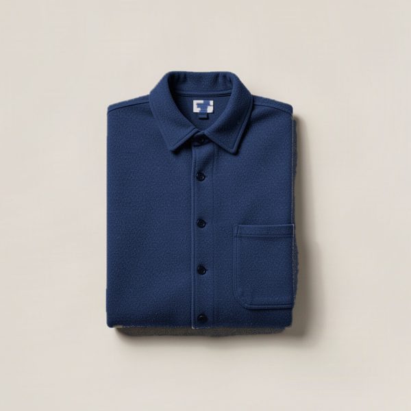 Driftwood Flannel Shirt in Navy — button-up flannel shirt, folded on a light grey backdrop