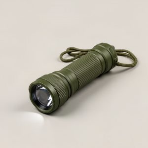 Ember Camp Torch — rugged olive-green camp torch with a ribbed grip and lanyard on a light grey backdrop