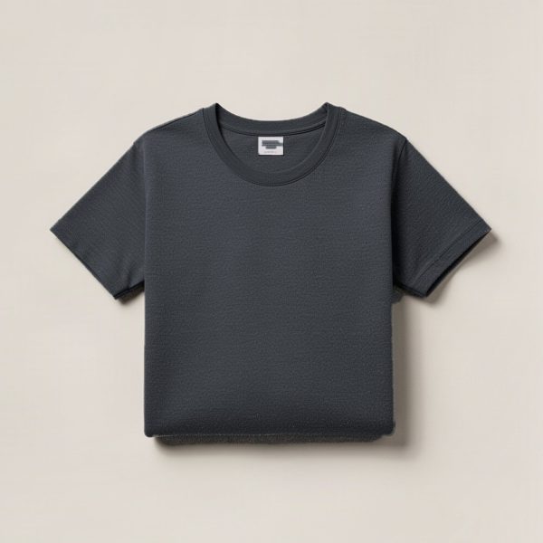 Ember Field Tee in Charcoal — crew-neck cotton t-shirt, folded on a light grey backdrop