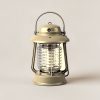 Ember Lantern in Sand — camp lantern with a domed top, carry handle and ribbed diffuser on a light grey backdrop