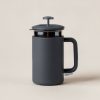 Ember Travel Press in Charcoal — travel coffee press mug with a plunger lid and a handle on a light grey backdrop