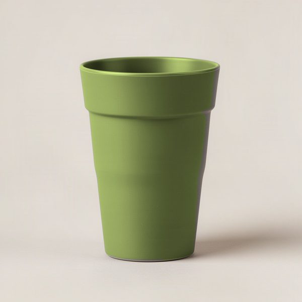 Granite Pint Cup in Moss — stackable pint cup with a flared rim on a light grey backdrop
