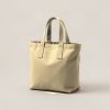 Granite Tote in Sand — canvas tote bag with two flat handles on a light grey backdrop