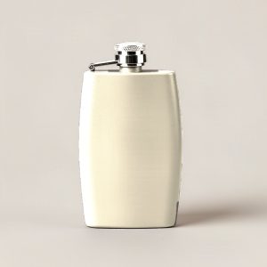 Granite Trail Flask in Cream — slim hip flask with a hinged screw cap on a light grey backdrop