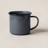 Harbor Enamel Mug in Charcoal — enamel camp mug with a rolled rim and a C-shaped handle on a light grey backdrop