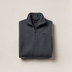 Juniper Fleece Pullover in Charcoal — quarter-zip fleece pullover, folded on a light grey backdrop