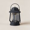 Juniper Lantern in Charcoal — camp lantern with a domed top, carry handle and ribbed diffuser on a light grey backdrop
