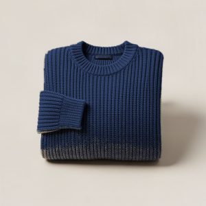 Juniper Watch Sweater in Navy — chunky ribbed-knit crew-neck sweater, folded on a light grey backdrop