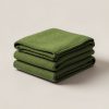 Juniper Wool Blanket in Moss — thick woven wool blanket with stitched edges, folded on a light grey backdrop