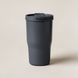 Lakeside Camp Tumbler in Charcoal — straight-sided insulated camp tumbler with a slip-on lid on a light grey backdrop