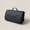 Lakeside Picnic Blanket in Charcoal — water-resistant picnic blanket, folded with a carry handle on a light grey backdrop