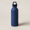 Ridgeline Steel Bottle in Navy — tall insulated steel water bottle with a screw-on cap and carry loop on a light grey backdrop