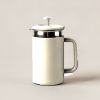 Ridgeline Travel Press in Cream — travel coffee press mug with a plunger lid and a handle on a light grey backdrop