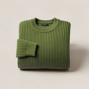 Ridgeline Watch Sweater in Moss — chunky ribbed-knit crew-neck sweater, folded on a light grey backdrop