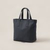 Ember Tote in Charcoal — canvas tote bag with two flat handles on a light grey backdrop