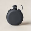 Trailhead Canteen in Charcoal — round flat-sided canteen with a screw cap and a carry strap on a light grey backdrop