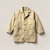 Trailhead Chore Coat in Sand — boxy button-front chore coat with two patch pockets on a light grey backdrop