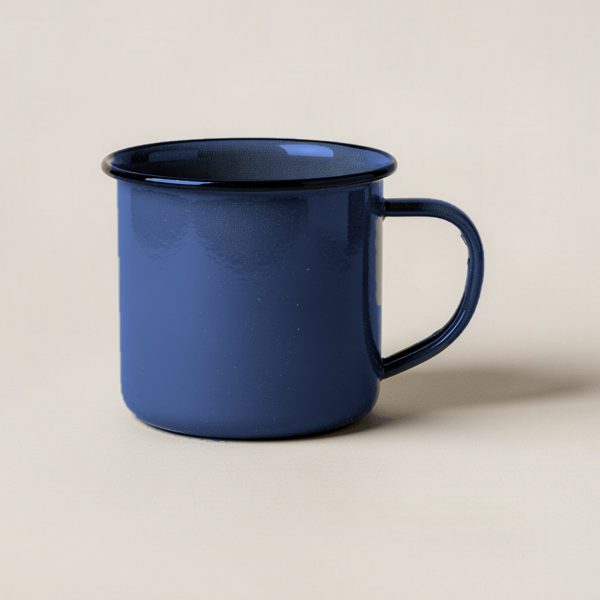 Trailhead Enamel Mug in Navy — enamel camp mug with a rolled rim and a C-shaped handle on a light grey backdrop