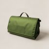 Trailhead Picnic Blanket in Moss — water-resistant picnic blanket, folded with a carry handle on a light grey backdrop