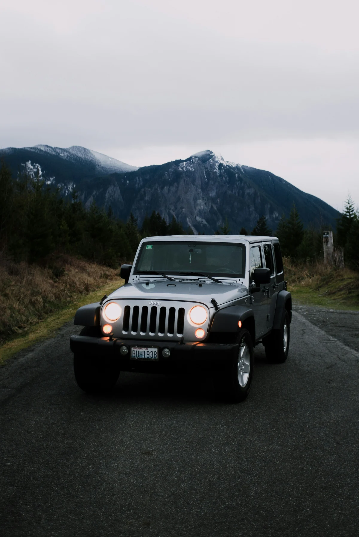 Illustrative photograph of an SUV on an autumn road — not listed inventory
