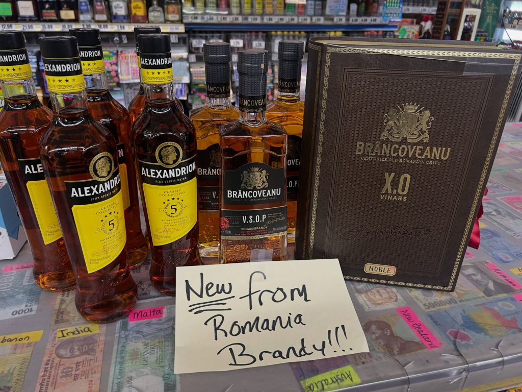 Romanian brandy with a handwritten sign: New from Romania, Brandy